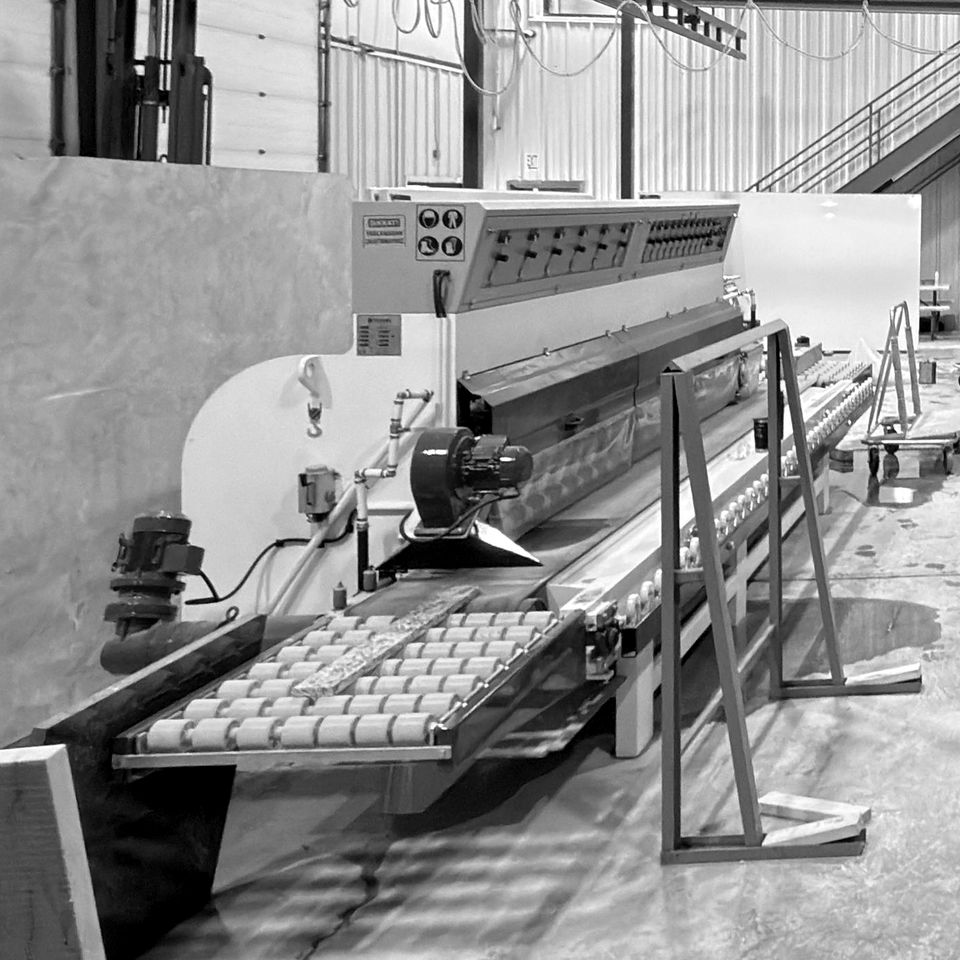 An automatic edge polisher with its roller table